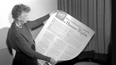 Eleanor Roosevelt holds a copy of the Universal Declaration of Human Rights, 1949