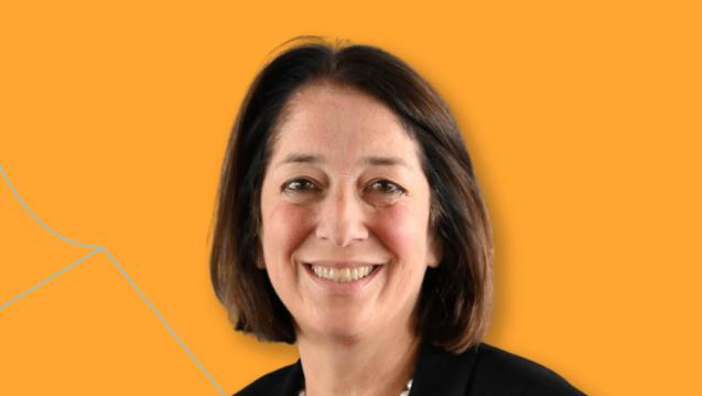 Anya Schiffrin Headshot Orange