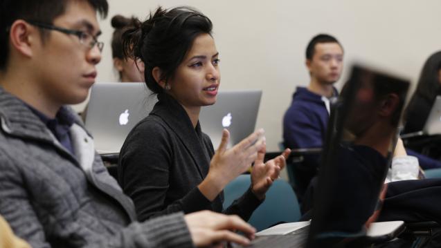 student speaking in classroom