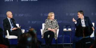 Vladimir Duthiers, Secretary Hillary Rodham Clinton, and David Miliband appeared at an IGP event on December 18.