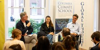 Luisa Neubauer, Ed Miliband, and Adam Tooze address the room during a roundtable event