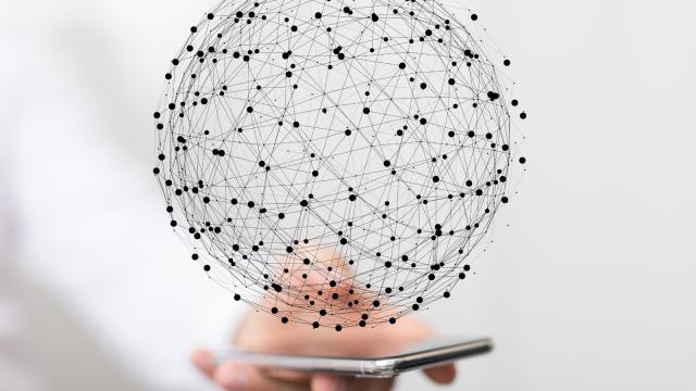 Person holding a phone with an illustration of a network